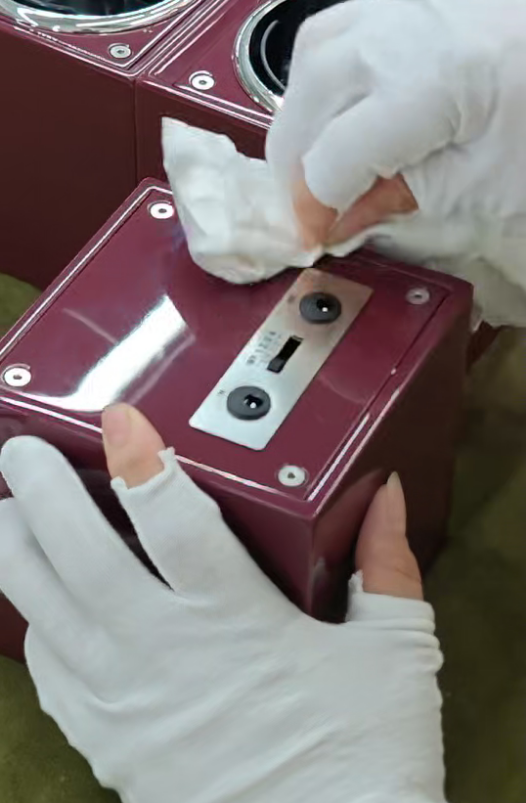 How to Customize a Single Watch Winder: Inside Our 8801 Red OEM Project插图7 Worker wiping and inspecting the watch winder control panel