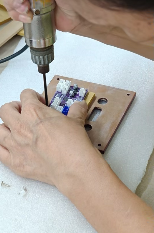 Assembling the circuit board and motor control panel
