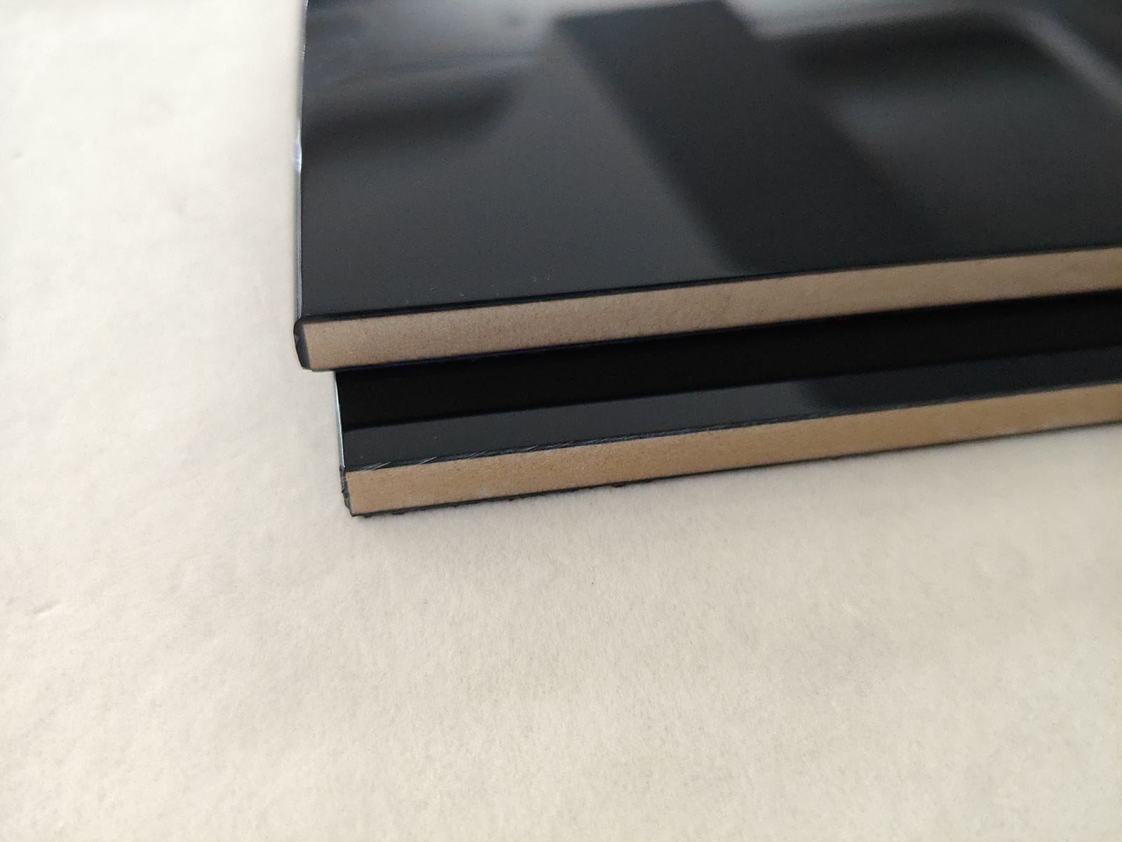 How to Source Piano-Lacquer Watch Boxes: Finish Quality Explained 2 Cross-section showing the thickness of a piano-lacquer build from stacked, polished coats