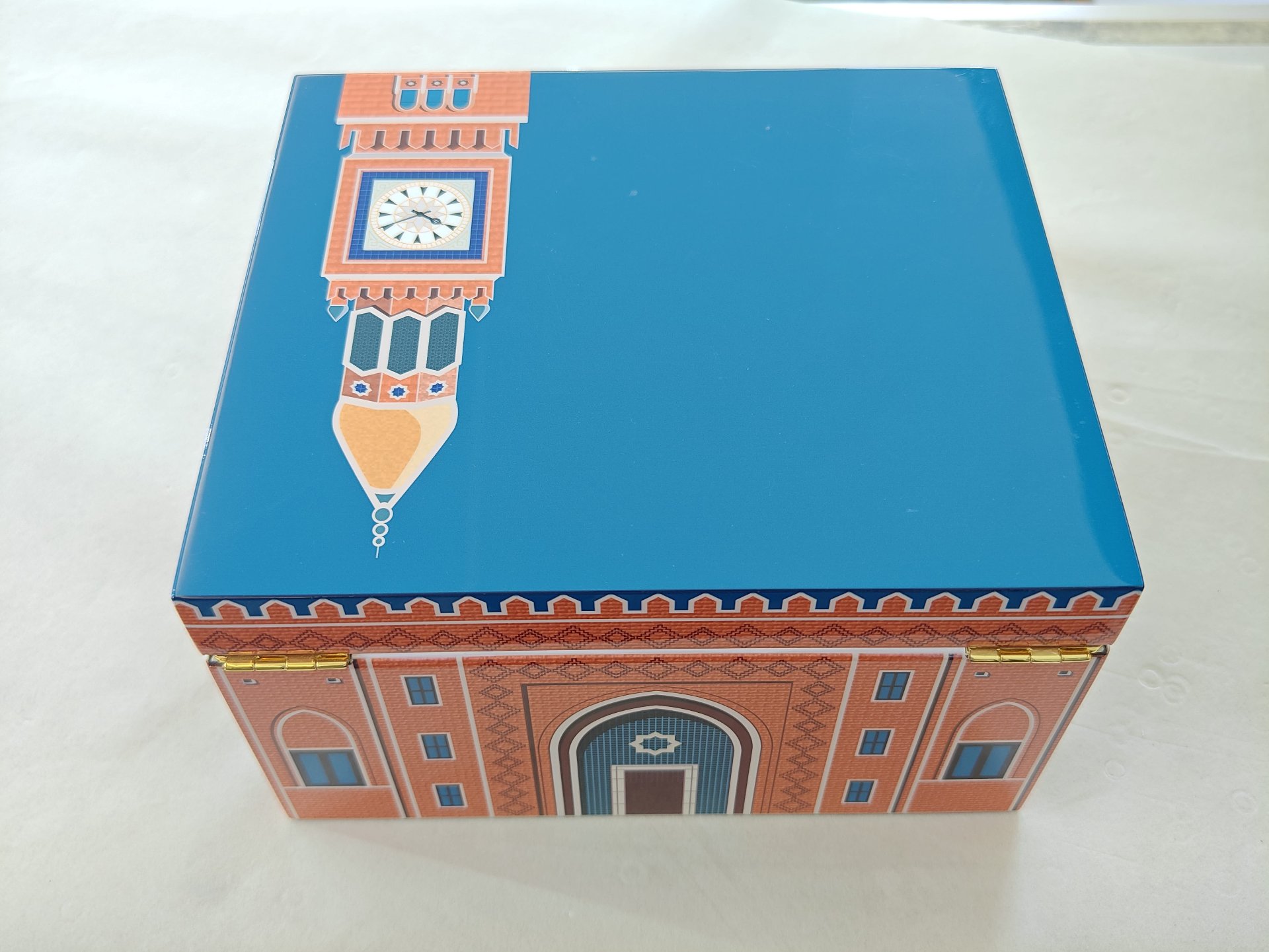 Custom Printed Wooden Watch Box - Landmark Lacquer Collection with Red Velvet Tray 3 Front three-quarter view of the lacquered wooden watch box showing gold-tone hinges